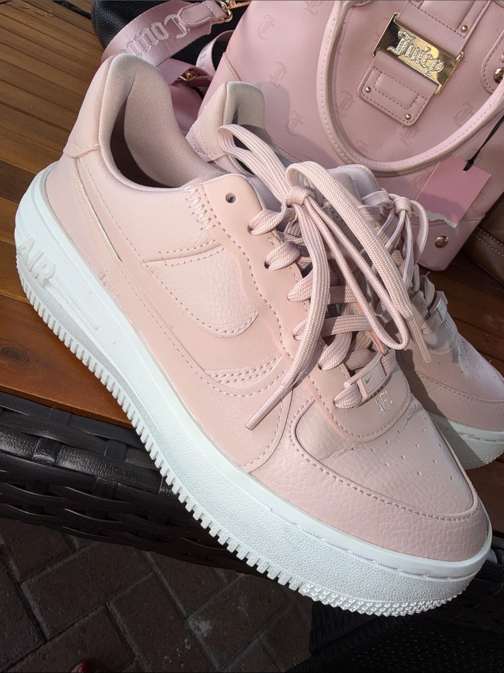 Nike Women’s Low-Top Pale Pink Leather Sneakers